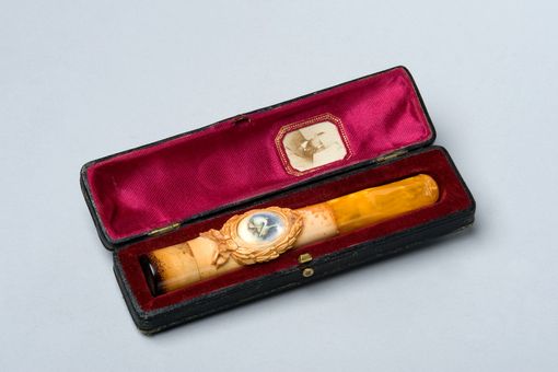 Hofer's case with a cigar holder